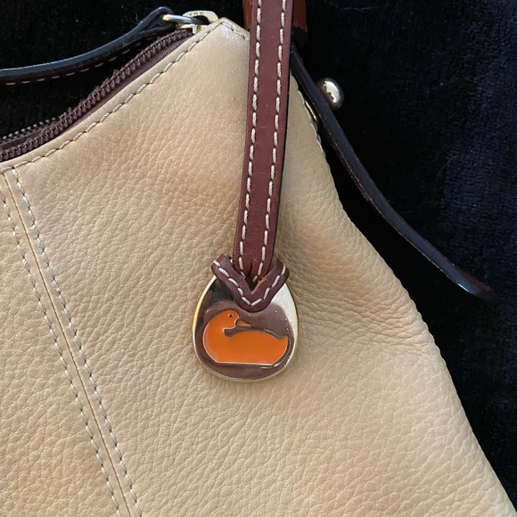 Dooney and Bourke bag. Soft tan/golden color with red interior - Picture 4 of 10